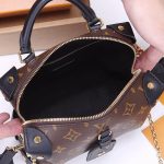 LV Petite Malle Souple Handbag